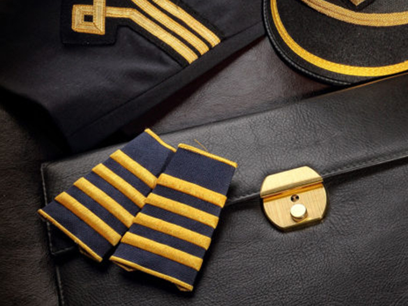 What do the stripes on a pilot's uniform mean?